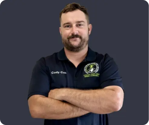 Portrait of a smiling technician named Cody wearing a branded Colco Pest and Weed Control polo.